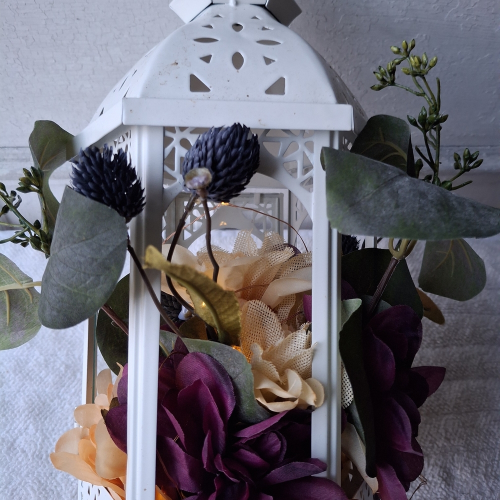 Home Accents White Lantern with Purple and Cream Floral Arrangement
